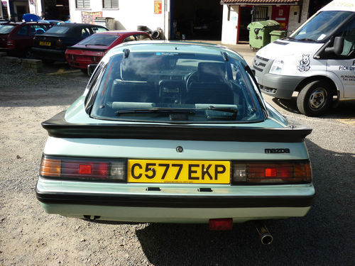 1986 mazda rx7 2 door coupe metallic green back